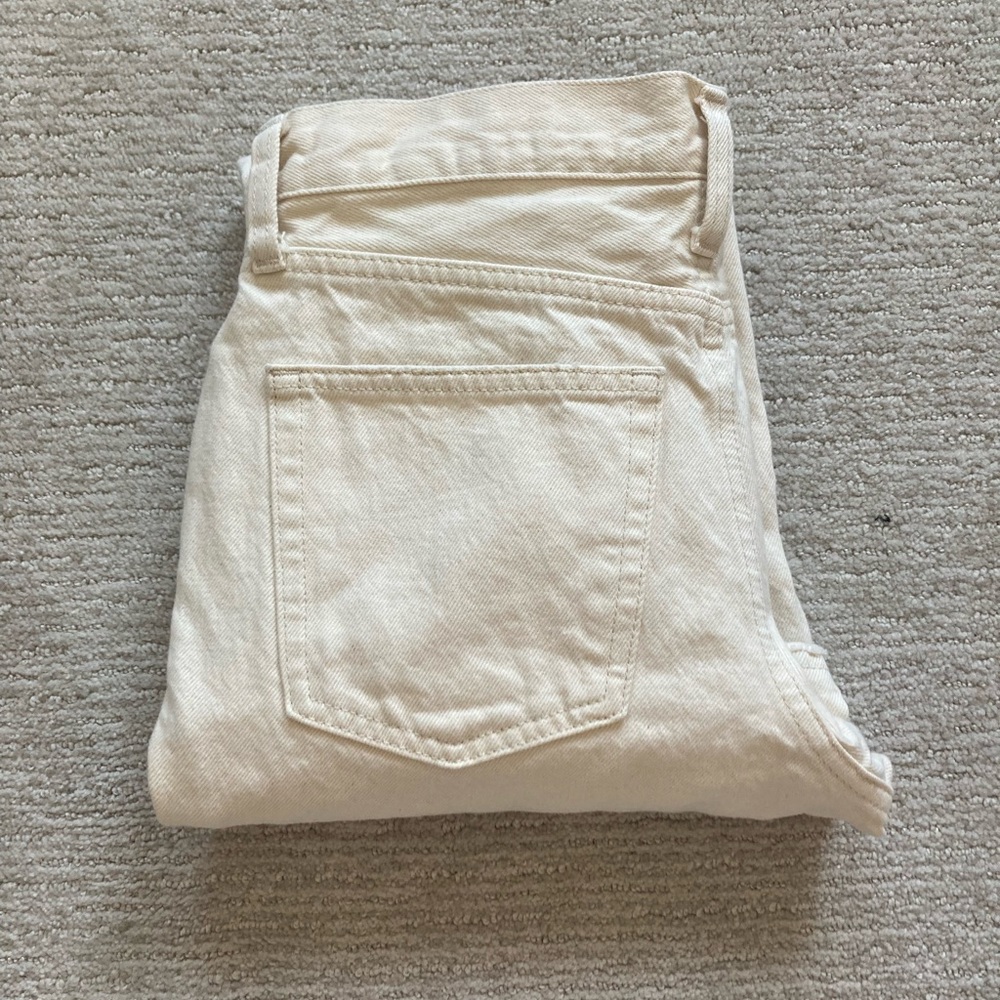 White boot cut jeans